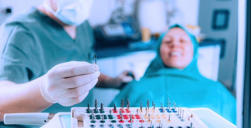 Dentist with prosthetist box set of tools for the installation dental implants